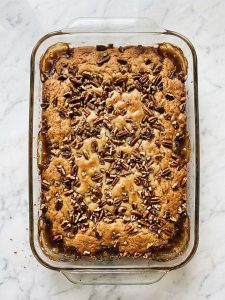 Step 6: The baked dump cake has a golden pecan topping and bubbling edges.