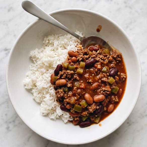 A bowl of Hawaiian-style chili with beans ladled over white rice